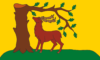 Berkshire flag: a stag reaching for the branches of an oak tree, in natural colours, on a yellow background